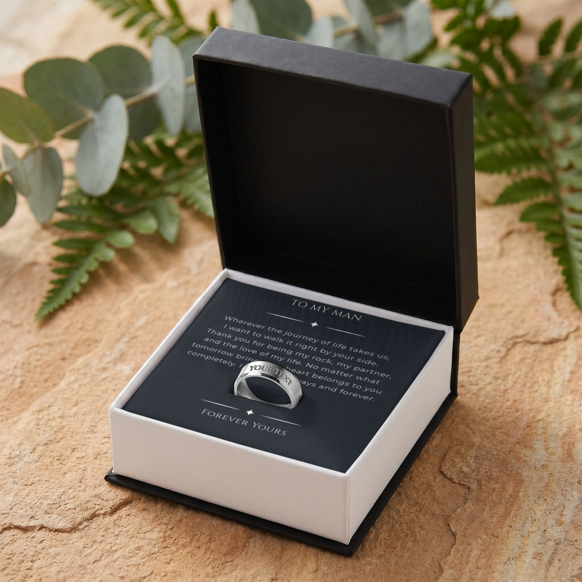 Personalized metal ring with custom text engraving