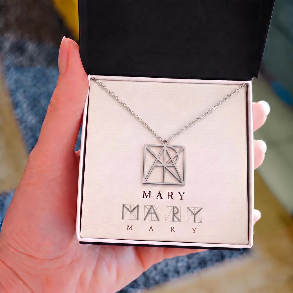 Custom geometric monogram name necklace in 18K gold