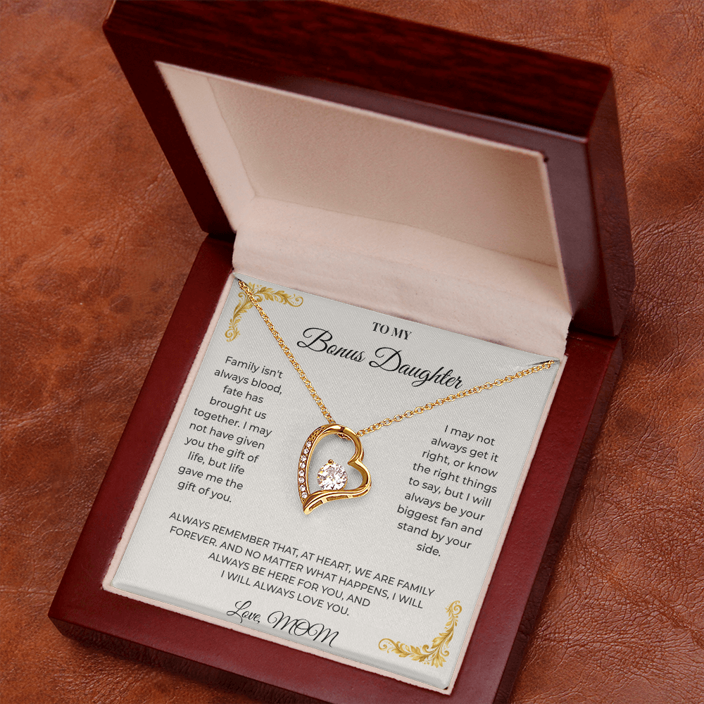 Open luxury gift box displaying the Written Affection bonus daughter keepsake necklace