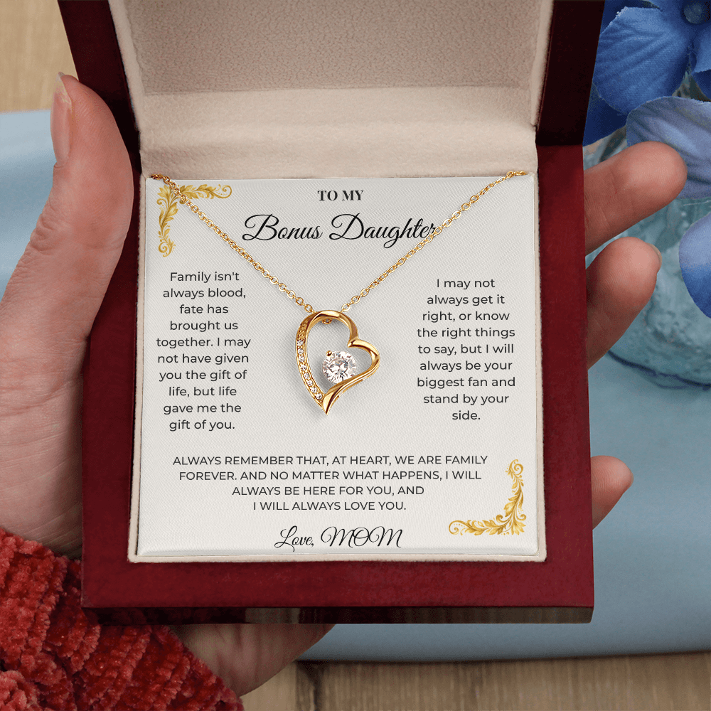 Open luxury gift box displaying the Written Affection bonus daughter keepsake necklace