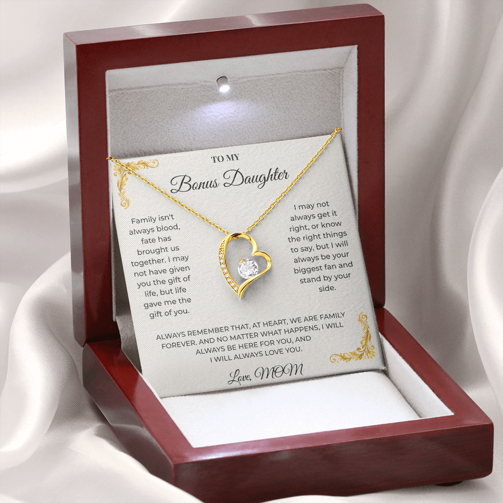 Open luxury gift box displaying the Written Affection bonus daughter keepsake necklace