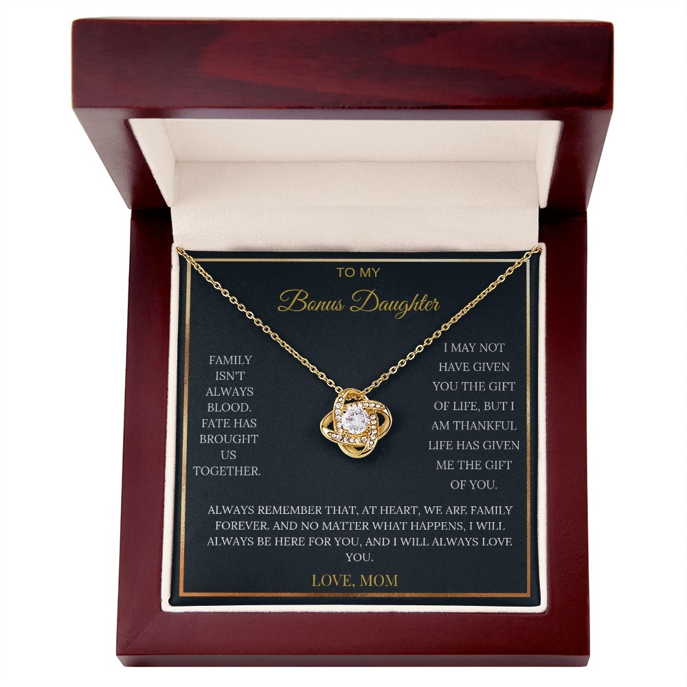 18k Yellow Gold Over Stainless Steel Love Knot Pendant with Cubic Zirconia