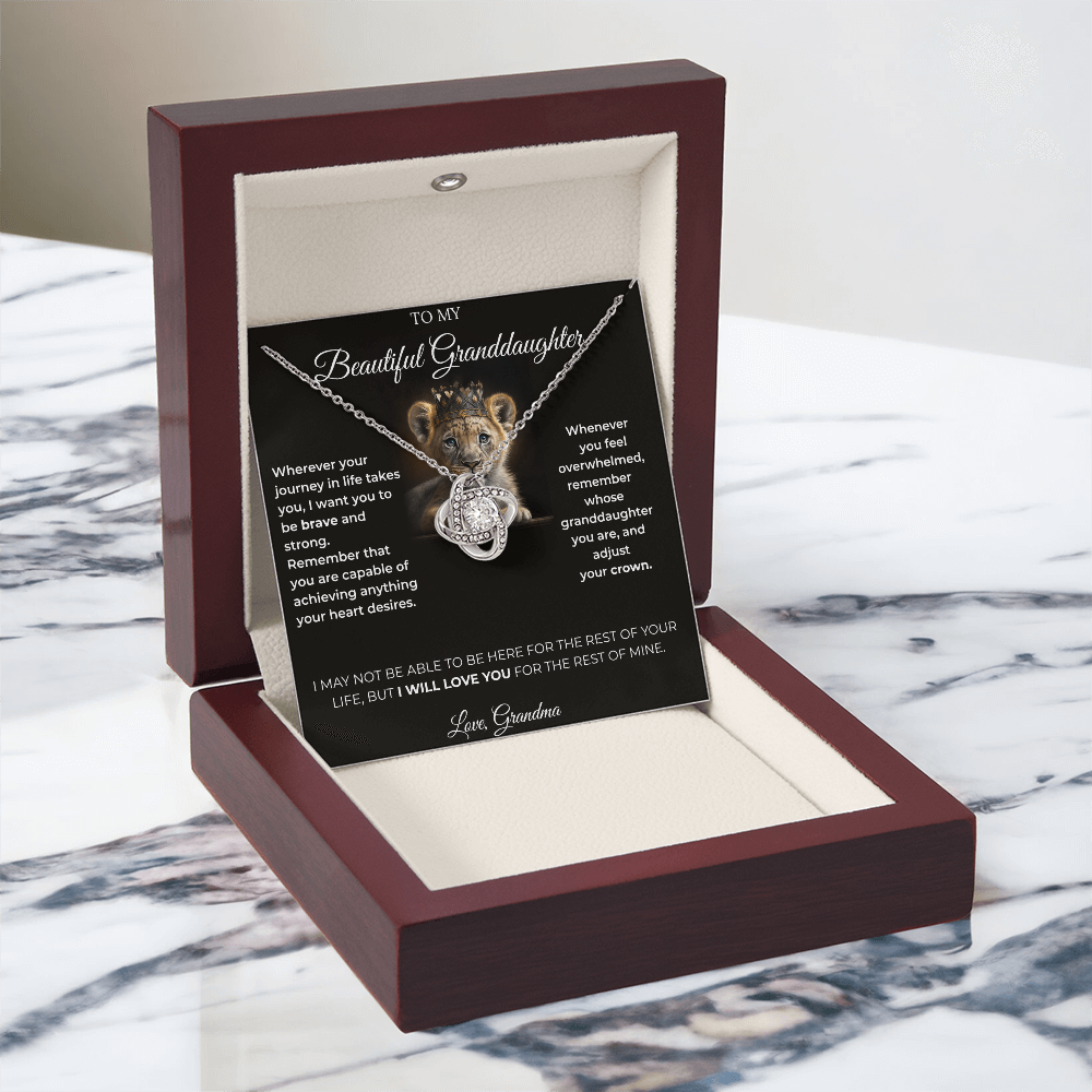 14k white gold finish Love Knot crystal pendant close-up
