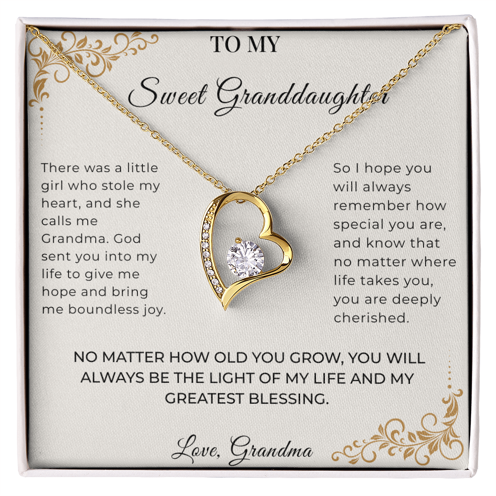 18k yellow gold finish Forever Love crystal pendant close-up shot