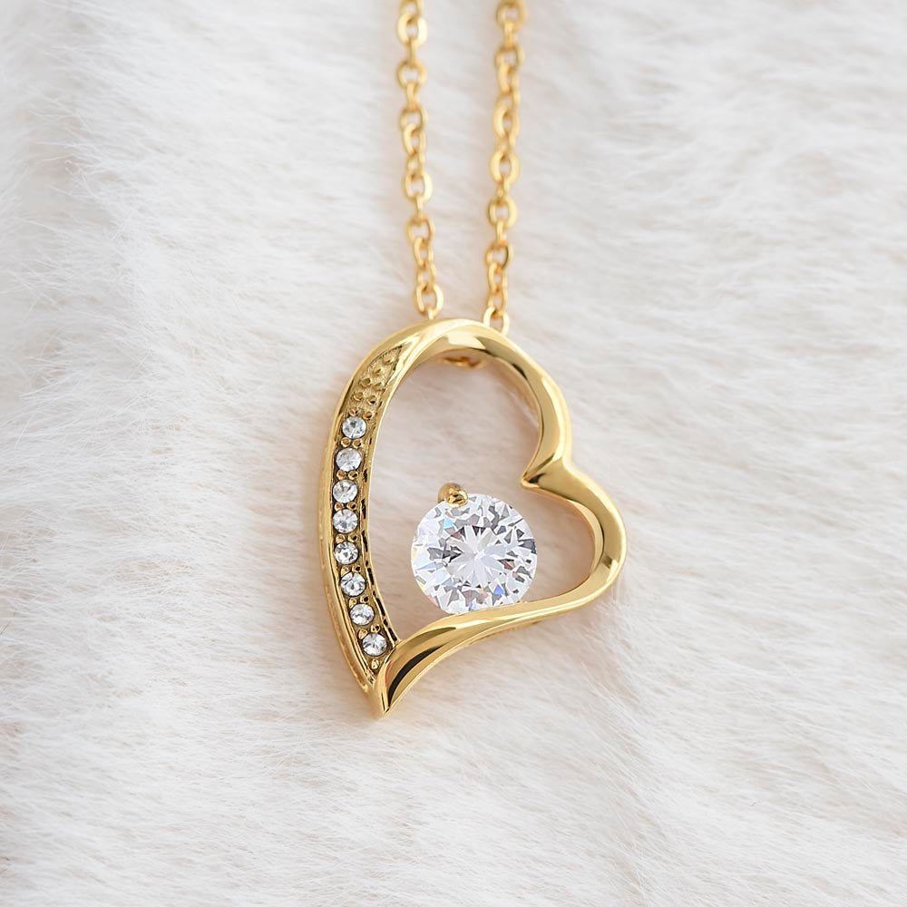 18k yellow gold finish Forever Love crystal pendant close-up shot