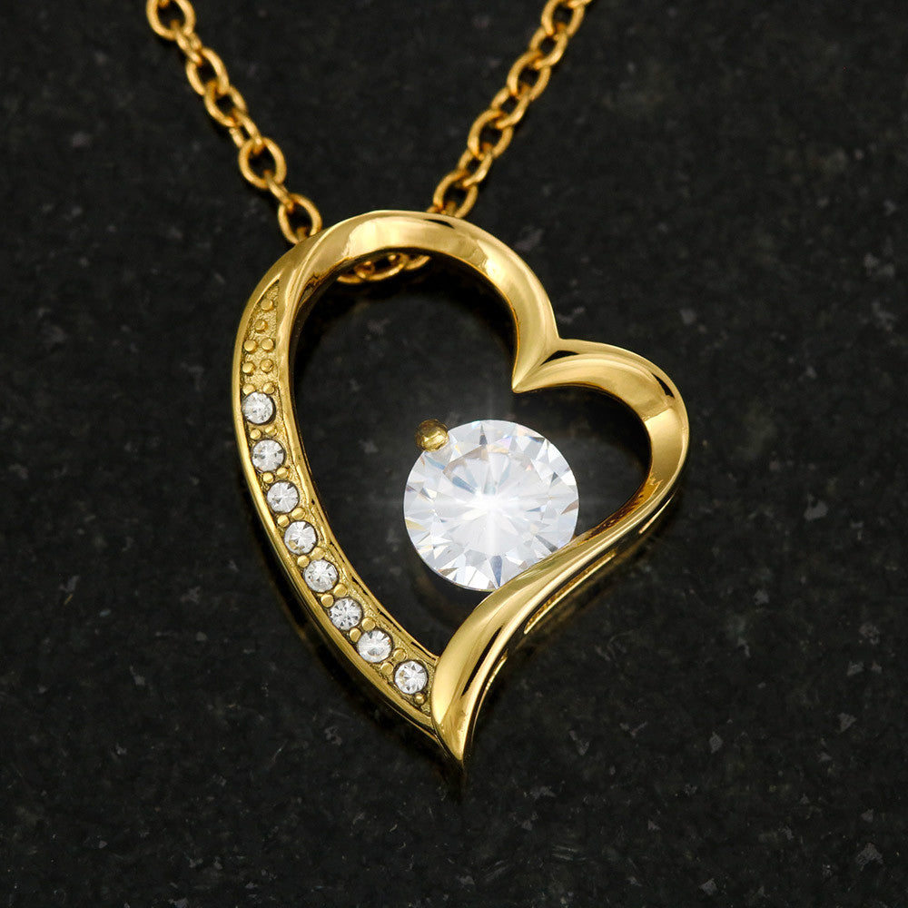 18k yellow gold finish Forever Love crystal pendant close-up shot